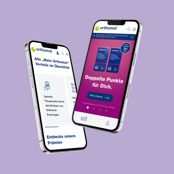 Two smartphones displaying the Orthomol app with loyalty points system. Orthomol app with loyalty point system on mobile devices